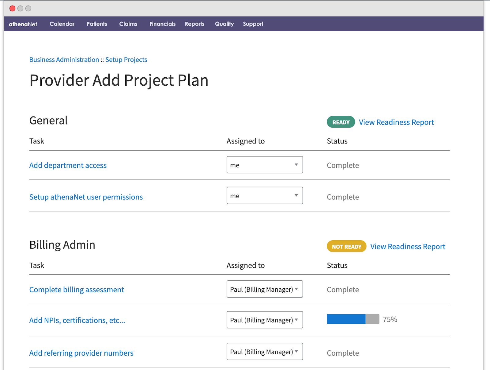 Person sitting on floor working on laptop